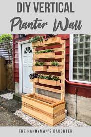 Diy Vertical Garden Wall Planter With Plans In 2020 Vertical Garden Diy Vertical Garden Wall Planter Vertical Garden Planters