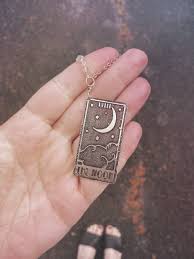 Slide one bead onto the string, followed by a crimping bead, then add another bead about 1 inch down. The Moon Tarot Card Necklace So Beautifully Broken