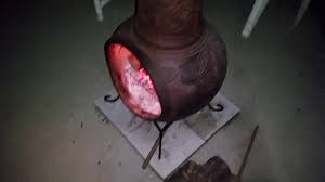 Use it to burn a fire or simply as a decorative accent. 37 Clay Kd Chiminea With Iron Stand From The Home Depot Youtube