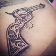 The blessed tattoo sends a strong message of self worth humbleness and dignity. 15 Latest Revolver Tattoo Designs