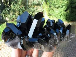 Quartz crystal is neither a solid nor a liquid. Irradiated Black Quartz