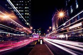 Bright Lights In The City S Night Traffic Lights City Lights At Night City Lights Lights
