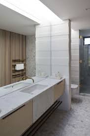 Filling the entire wall above your bathroom sink/counter, helps create a more spacious feel in your bathroom. Gallery Of Tuatua House Julian Guthrie 17 Bathroom Mirror Trends Big Bathrooms Large Bathroom Mirrors