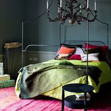 Green is the color of growth, so it's only natural to use green as your accent color in a bedroom decorated with a botanical theme like the one here. Dark Moody Bedroom Interior Design Bright Green Red Accents Decorating Ideas Rooms Sophie Robinson Freshsdg
