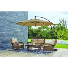 Hampton Bay 11 Ft Led Round Offset Outdoor Patio Umbrella In Sunbrella Sand Yjaf052 A The Home Depot Patio Outdoor Patio Umbrellas Patio Umbrella
