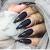 Black And Gold Stiletto Nails With Rhinestones