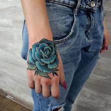 Blue Rose Tattoo On Hand For Girls Rose Hand Tattoo Hand Tattoos Blue Rose Tattoos