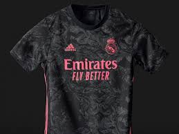 It's black with a grey collar. New Third Kit For Real Madrid Uniswag