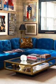 Opting for a curvy blue sofa is a great way to soften a space, especially a living space with lots of hard surfaces and harsh lines. 15 Stylish Living Room Lighting Ideas Well Lit Living Room Tips