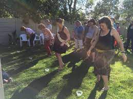 Baby Shower Games My Water Broke Guests Have Balloon Bellies Waddle To A Bucket With A Sponge Between Their Legs Baby Shower Games Shower Games Baby Shower
