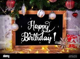Happy Birthday Christmas Blackboard With English Calligraphy Happy Birthday Christmas Tree With Ball Gifts And Fairy Lights Stock Photo Alamy