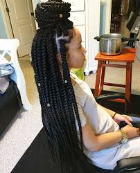 Box braids are made by first parting the hair into individual boxes one at a time. The 411 On Box Braids Why They Re Great And How To Wear Them Bun Braids