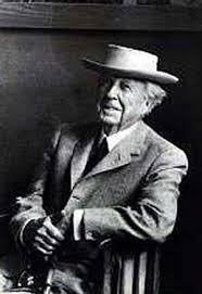 Architect frank lloyd wright working at desk in his home taliesin premium photographic print by alfred eisenstaedt. Frank Lloyd Wright
