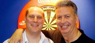 Magnus Caris en Nigel Heydon op Grand Slam of Darts
