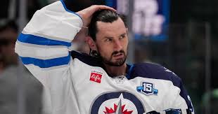 Connor Hellebuyck Suspended by Jets for Missing 2026 Training Camp: NHL Star Holdout Tests CBA Power
