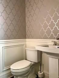 Discover the best small bathroom designs that will brighten up your space and make the whole your tiny bathroom just might become your new favorite room. We Love The Look Of A Shimmery Metallic Stencil Pattern Don T You Bonnie From Beautiful On T Wallpaper Accent Wall Bathroom Trendy Bathroom Bathroom Interior