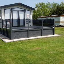 Decorative smoked glass panels and where to use them. Decking With Tinted Toughened Glass Panels Decking Supply Install Call 01745 827775