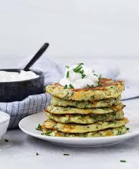 This makes our zucchini dumping the rest of the zucchini fritter ingredients into the bowl and mixing well with your hands until you have a fritter batter. Zucchini Fritters With Cheddar And Chives Pancake Recipes