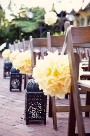 Add a cheap strip of fabric as a runner and avoid paying for upgraded linens in your colors. Simple Summer Wedding Aisle Decor Mywedding