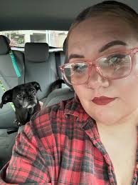 Here are some pictures with my pup! She's a black pug/beagle mix named  Penny Lane Ham Sandwich. She was the flower girl at our wedding! She has  the same personality of Moo