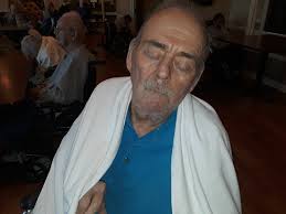 Update: He has been gargling with warm salt water and says he can at least  swallow now. He is also taking ibuprofen around the clock. He has an appt  at Pat Walker