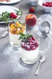 Bavarian Cream Served In Glassed With Fruit Raspberries And Peaches Dusted With Powdered Sugar Bavarian Cream German Desserts Authentic Recipes