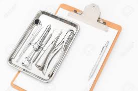 Dental Tools Equipment And Dental Chart On White Background