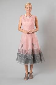 Soft Pink For The Modern And Elegant Mother Of The Bride And Mother Of The Groom An Ideal Co Tea Length Dresses Mother Of Bride Outfits Mother Of The Bride