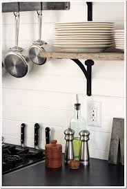 This solution can hold bottles and jars of every shape without looking out of place. Chalkboard Painted Countertops Open Kitchen Shelves Assortment