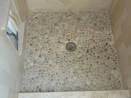 Flat White Pebbles Shower Floor Used In Secondary Baths Shower Floors No Tubs In This House Pebble Shower Floor Mosaic Shower Tile Shower Floor