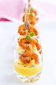 A lemony herb marinade transforms cooked shrimp into extraordinary seafood. Succulent Shrimp Shooters With Mango Sauce Tapas Recipes Shooter Recipes Elegant Appetizers