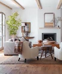 These ideas are elegant and super simple to implement. Becki Owens Design Trend 2018 Mixed Wood Tones Modern Farmhouse Living Room Decor Farm House Living Room Living Room Decor Rustic