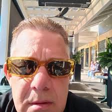 What is the cost of a 6 feet high and 17 feet long brick fence in Orange  County?