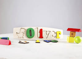 Kids delight in seeing their name in print and their photo on the printed dedication. Dinosaur Personalised Name Puzzle By Natural Gift Store Notonthehighstreet Com