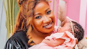Five days later, Chosen Becky reveals birth of daughter Amber Grace Mutebi