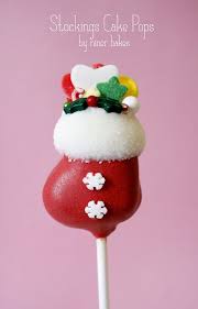 The cake pops are made with cake mix, homemade frosting, sugar cones, and lots of almond bark and candy melts. Niner Bakes Christmas Christmas Cake Pop Stocking Cake Pop Holiday Cake Pop Christmas Cake Christmas Cake Pops