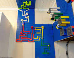 The 35 lego theme party table decoration ideas showcased in today's post will prove to be a blessing for families with young builders. Cool Lego Wall For Kids Room Decor Lego Wall Lego Room Kids Room