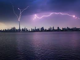 A picture taken from nad al sheba shows the burj khalifa silhouetted against the night sky during a thunderstorm. Photos Gulf News Readers Share Pictures Of Rain Lightning And Flooded Roads In The Uae Readers Photos Gulf News
