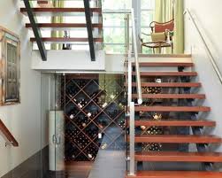 It gives us an easy way to access storage in a tight space, and hides it all away behind a door. 25 Under Stairs Wine Cellars And Wine Storage Spaces Digsdigs