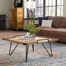 How are the legs of a coffee table made? 17 Stories Merrisa Coffee Table With Tray Top Reviews Wayfair