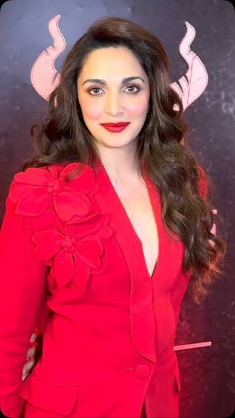 Not Nadia aka Kiara Advani literally setting the Toxic music launch on fire  in this red fit! We can’t wait to see her bring pure power and passion to  Nadia on the big screen. ????✨, BollywoodPaparazzi