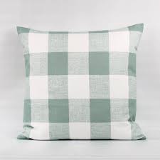 This is our first home so we are they come in decent sizes these days and hold them up against your sofa. Green Buffalo Plaid Throw Pillow Cover