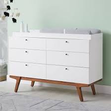 It is made of wood and reinforced with chain. Modern 6 Drawer Changing Table