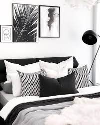 Black And White Is A Classic Color Combination And For A Good Reason The Strong Neutrals Serve A White Bedroom Decor White Bedroom Design Monochrome Bedroom