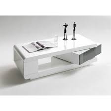 Cette table basse laquée blanche de forme rectangulaire, séduit par son design et son tiroir gris laqué rotatif à 360°. Table Basse Blanc Laque 1 Tiroir Cbc Meubles