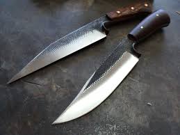 Then the shape of the knife is forged out. Bladesmithing New England School Of Metalwork