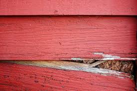 Piece of replacement steel siding. Siding Repair Costs Stop Over Paying For Your Siding Repair