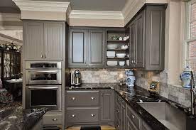 You can try to bring out this look in your cabinets using kitchen how to pick cabinets, who makes the best cabinetry, and what kitchen cabinet trends to avoid are probably some of the questions on your list. Dark Grey Kitchen Grey Kitchen Cabinets Kitchen Cabinet Design Painting Kitchen Cabinets