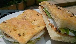 Either of two varieties of focaccia, . Focaccia Fugassa Or Figassa Pesto Pistou