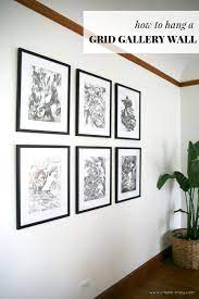 I suggest using blue painters' tape to put a little piece at the bottom of where you're planning to put the frame on the wall. How To Measure And Hang A Grid Gallery Wall Dining Room Art With Affordable Custom Frames Hardware Dining Room Gallery Wall Grid Gallery Wall Dining Room Art